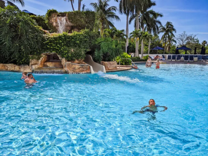Taylor Family in Swimming Pool at Naples Grande Beach Resort Naples Florida 6