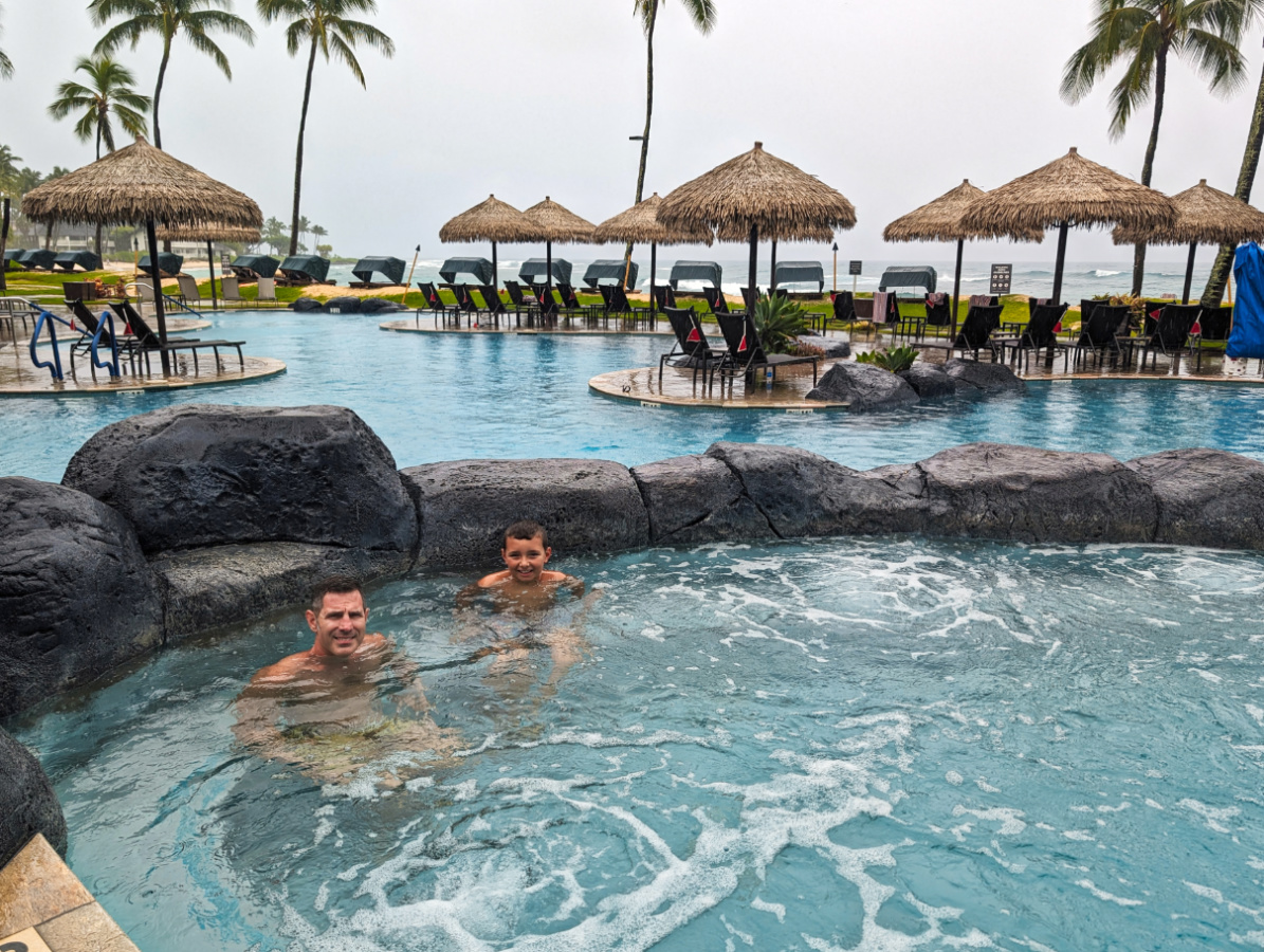 Taylor Family in hot tub swimming pool at Sheraton Kauai Resort Poipu South Shore Kauai Hawaii 1