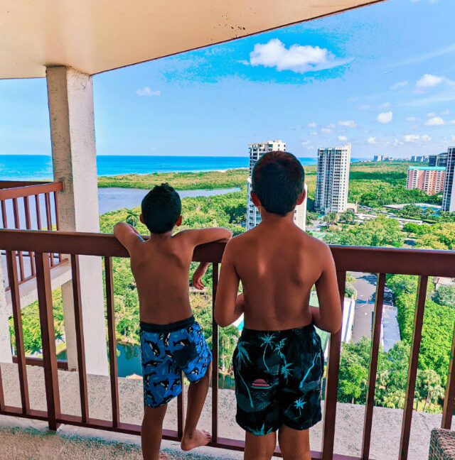 Taylor Family on Balcony at Naples Grande Beach Resort Naples Florida 3
