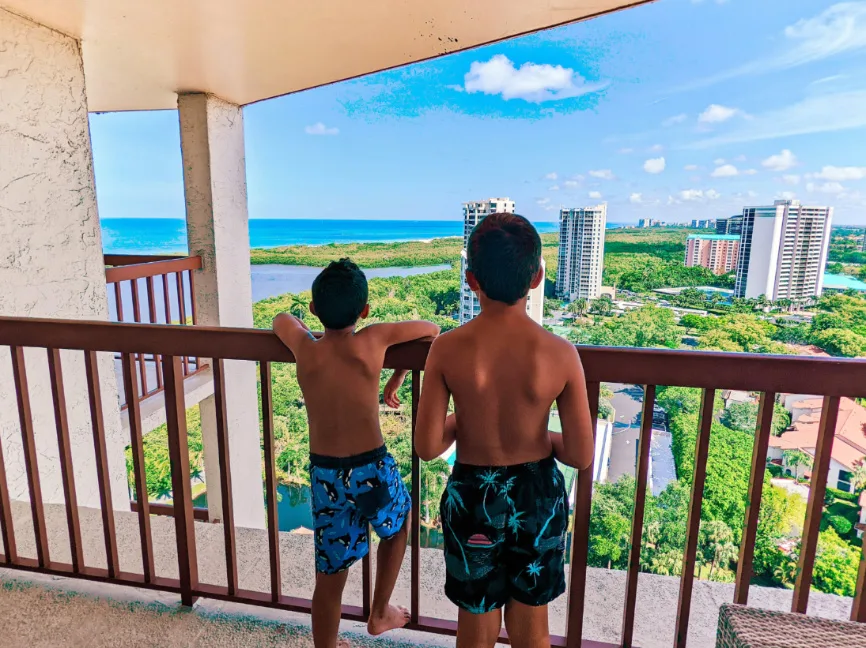 Taylor Family on Balcony at Naples Grande Beach Resort Naples Florida 3