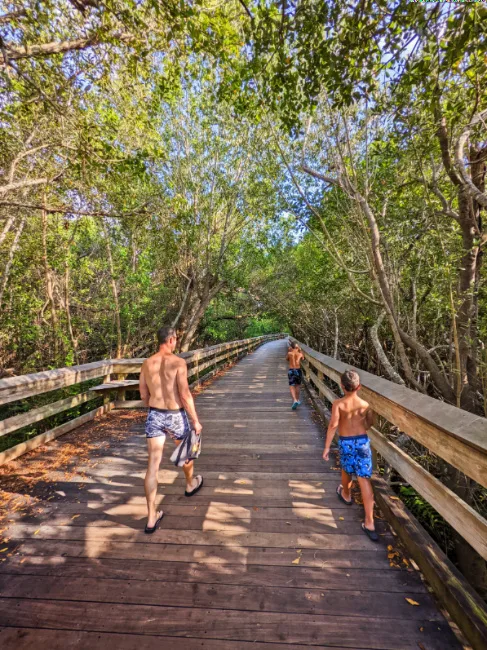 Taylor Family on Estuary Boardwalk to Beach at Naples Grande Beach Resort Naples Florida 3