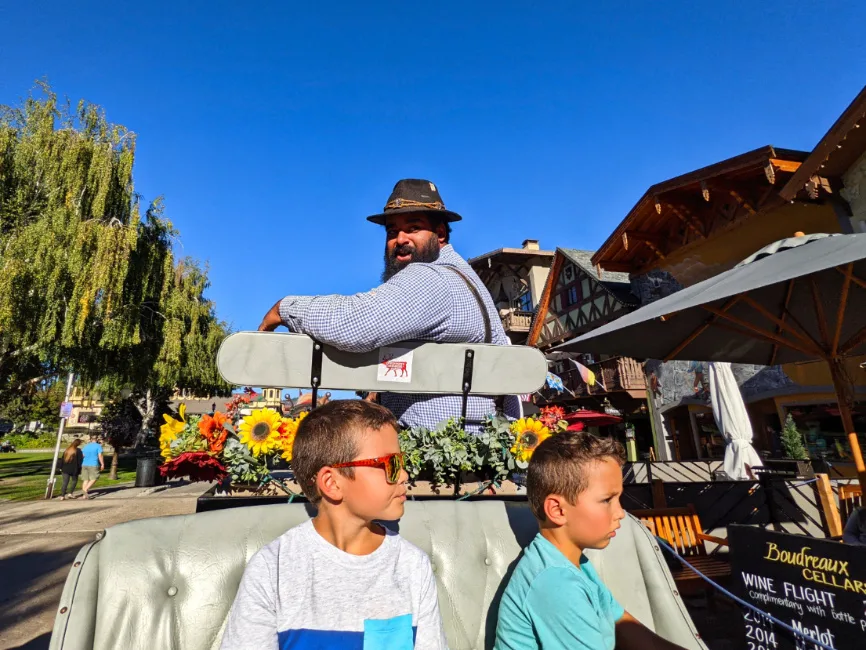 Taylor Family on Flower covered Horse Drawn Carriage Downtown Leavenworth Washington 2