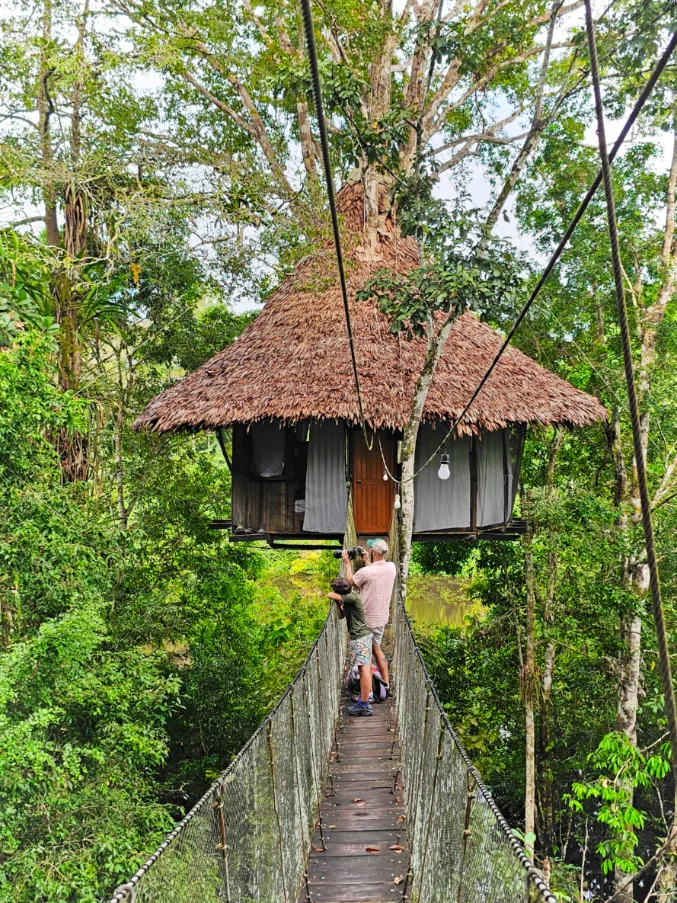 Taylor Family on Swinging Bridge at Treehouse Lodge Amazon Rainforest Peru 4