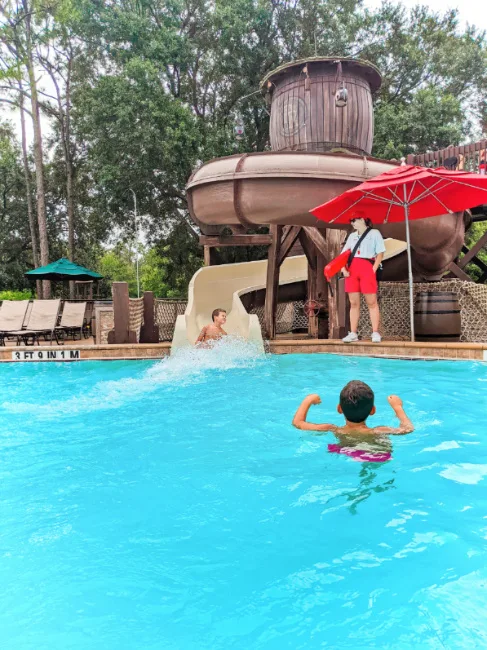 Taylor Family on Waterslide at Meadows Swimming Pool Fort Wilderness Resort and Campground Disney World 1