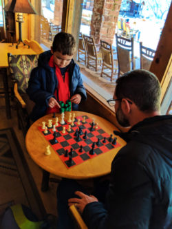 Taylor Family playing chess at Zion Lodge Zion National Park Utah 2