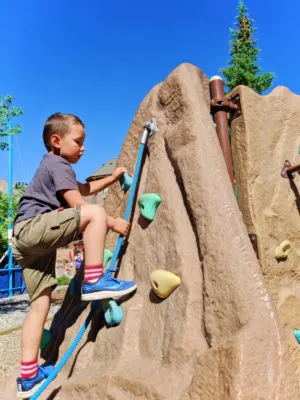 Taylor Family playing on playground at Big Sky Resort Montana 2