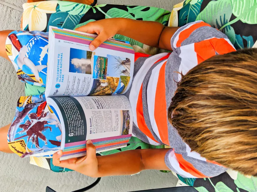 Taylor Family reading Moon Guides Open Road Best USA Road Trips 3