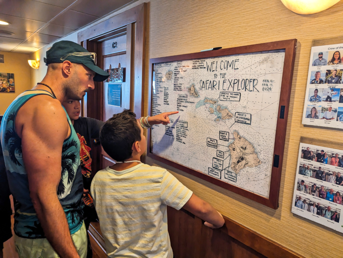 Taylor Family reviewing Wildlife Sightings onboard Safari Explorer UnCruise Hawaii 1