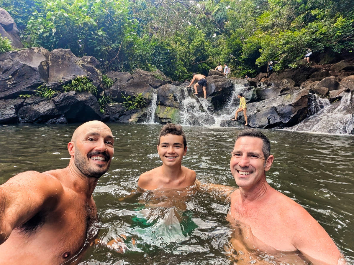Taylor Family swimming in Waterfall at Judd Trail Hiking Honolulu Oahu Hawaii 1