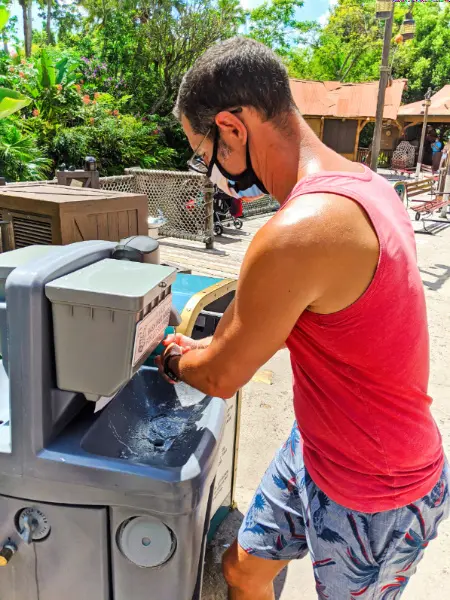 Taylor Family using Mobile Hand Washing Station in Magic Kingdom Walt Disney World 2020 1