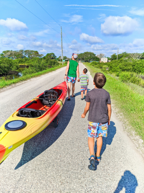 Taylor Family walking kayaks to Matanzas River Butler Beach St Augustine Florida 2020 1