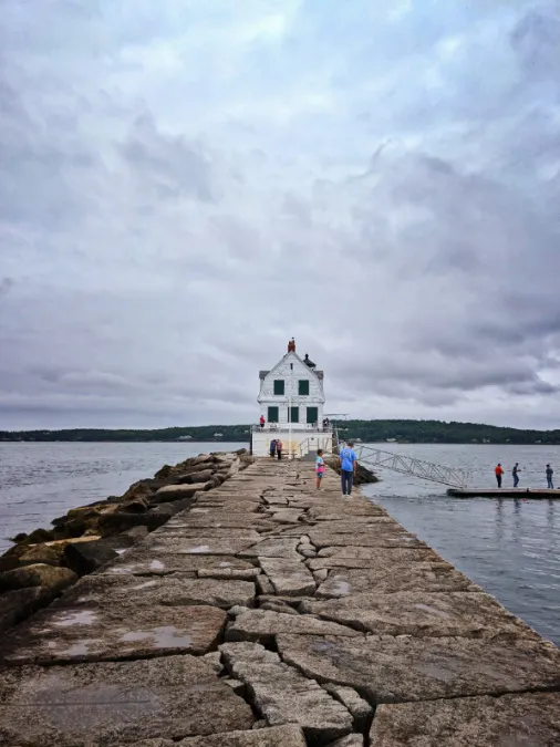 Taylor Family walking to the Rockland Breakwater Lighthouse Rockland Maine 3