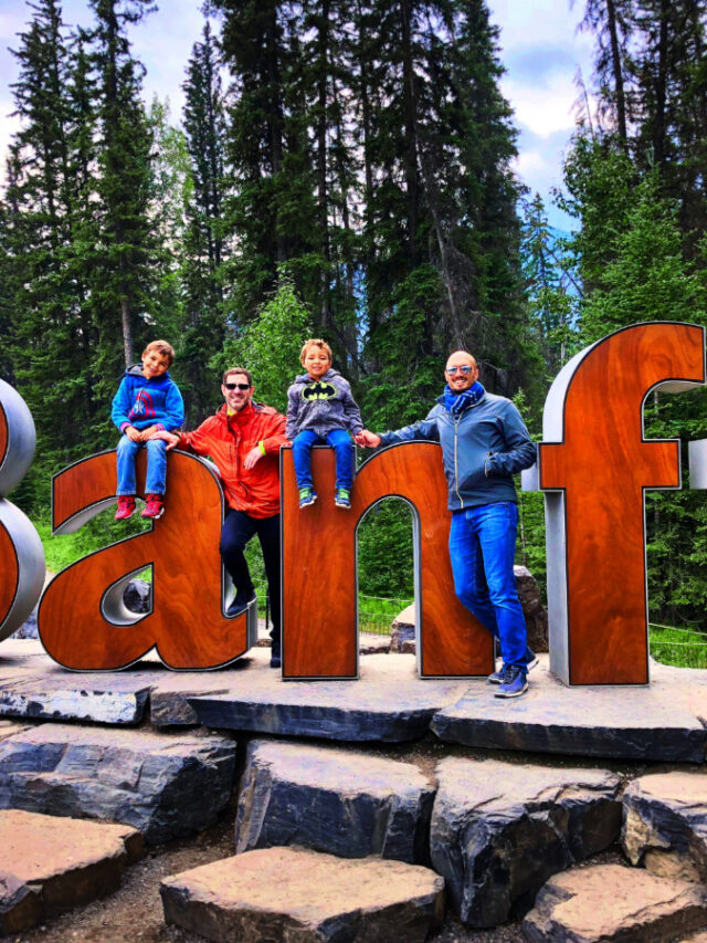 Taylor Family with Giant Banff Sign Banff National Park Alberta 1b