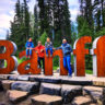 Taylor Family with Giant Banff Sign Banff National Park Alberta 1b