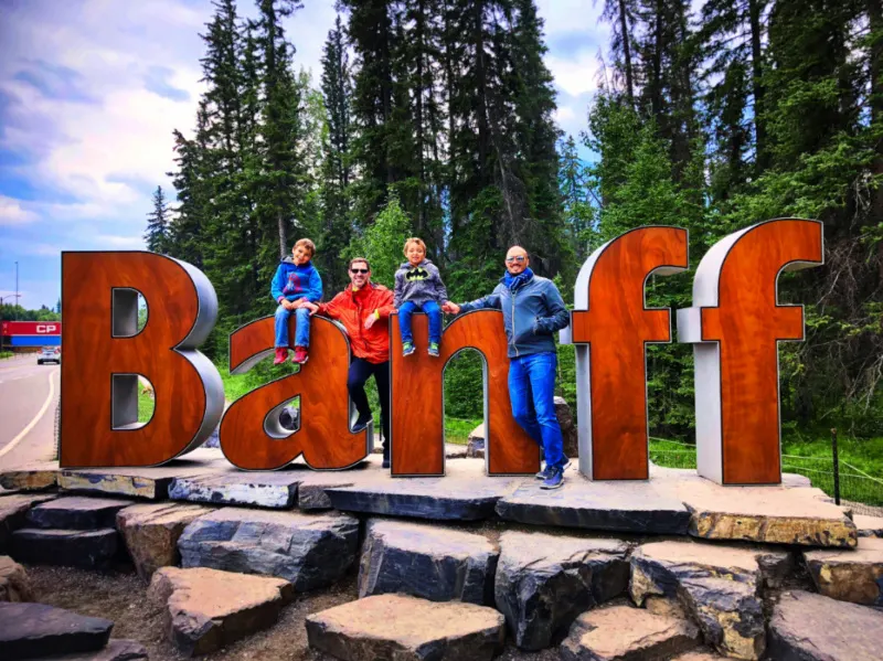 Taylor Family with Giant Banff Sign Banff National Park Alberta 1b