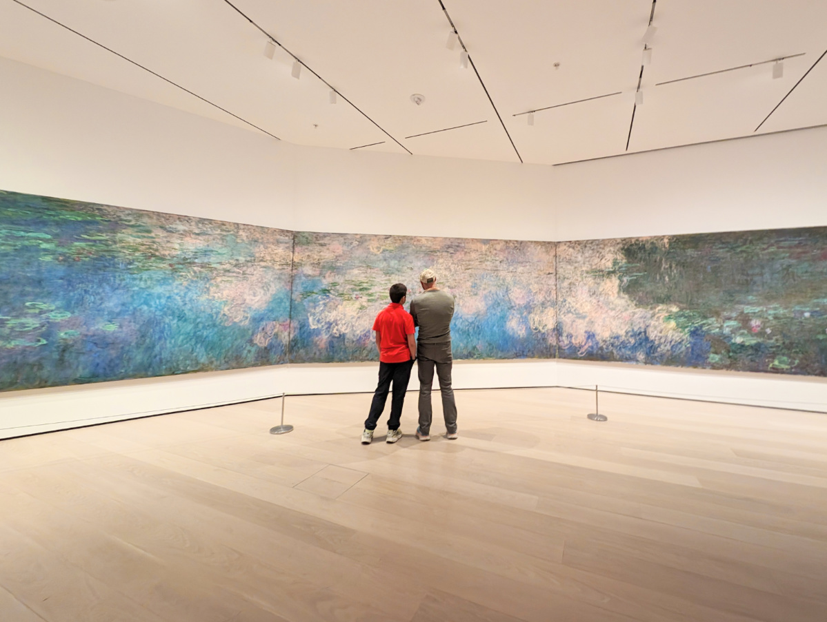 Taylor Family with Monet Waterlilies painting at MOMA Museum of Modern Art New York City 1