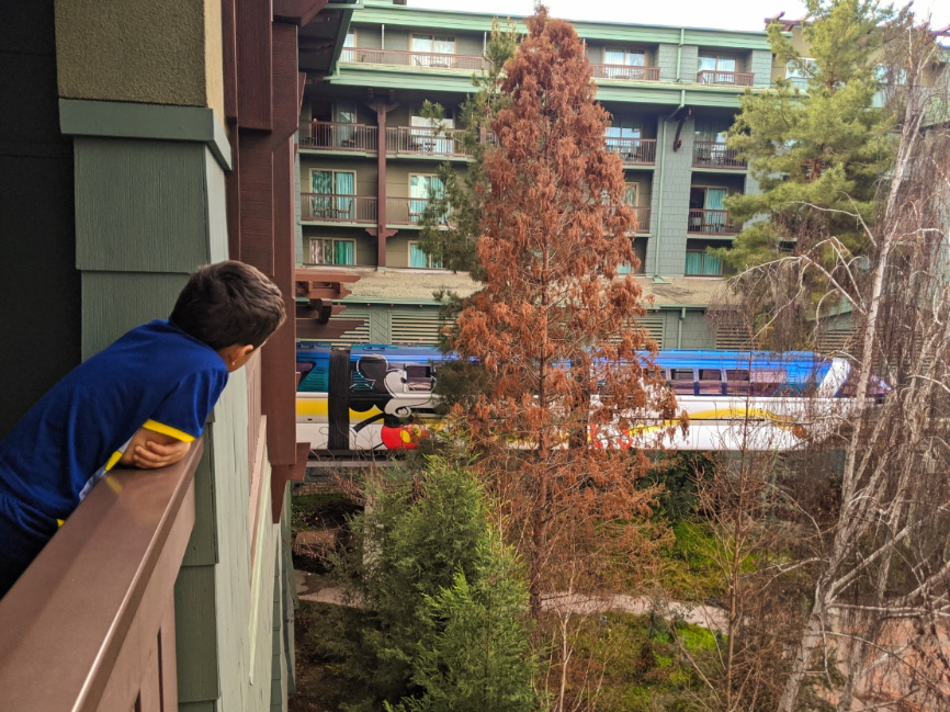 Taylor Family with Monorail going through Disneys Grand Californian Hotel Disneyland 2b