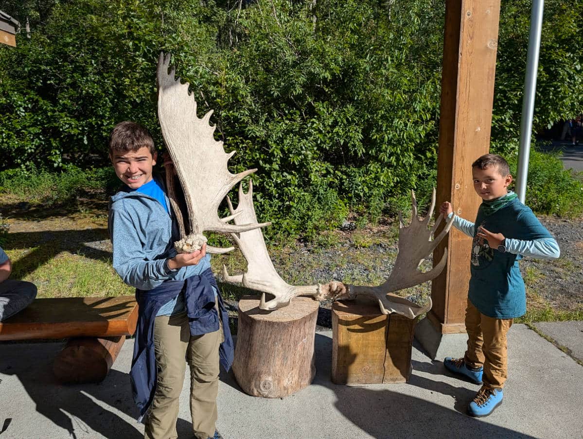Taylor Family with Moose Antlers at Exit Glacier Visitor Center Kenai Fjords National Park Alaska