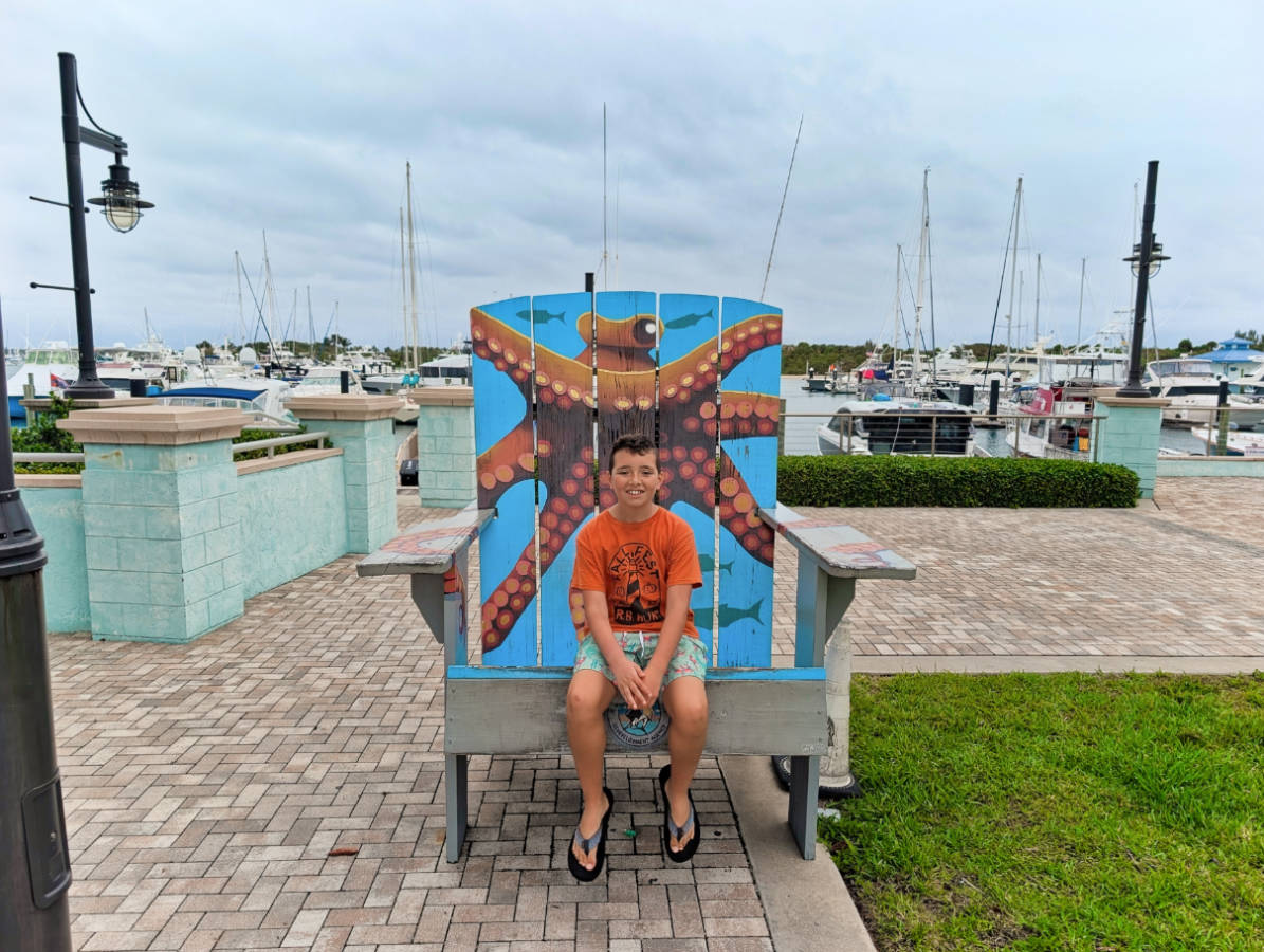 Taylor Family with Octopus Adirondack Chair in Riviera Beach Marina Florida 1