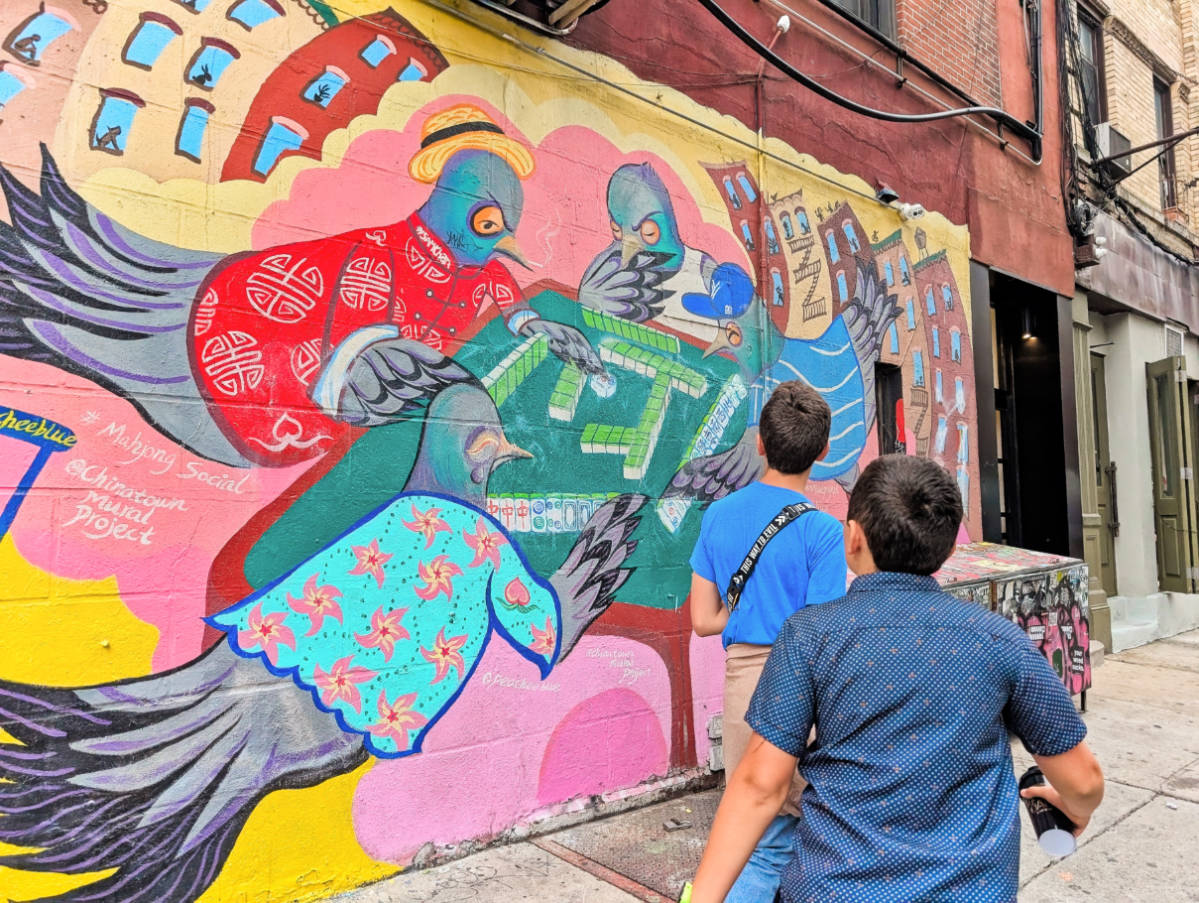 Taylor Family with Street Art Pigeon Mural in Chinatown New York City 1