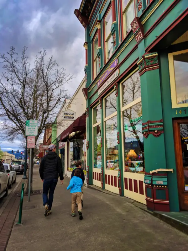 Taylor Family with Victorian building downtown Grants Pass Oregon 1