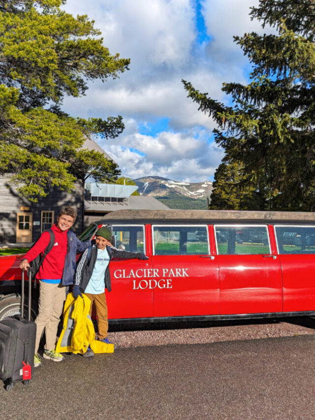 Taylor Family with Vintage Red Glacier National Park Tour Bus at Glacier Park Lodge East Glacier Montana 3