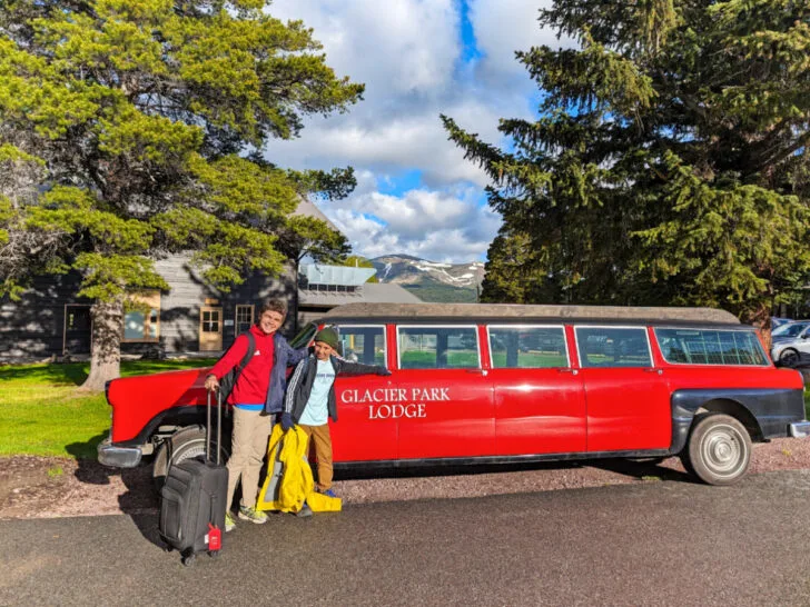 Taylor Family with Vintage Red Glacier National Park Tour Bus at Glacier Park Lodge East Glacier Montana 3