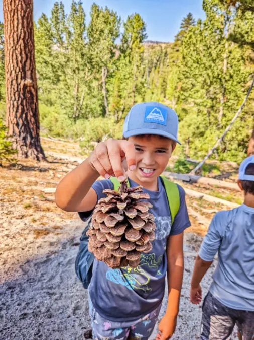 Taylor Family with pinecone Devils Postpile National Monument Mammoth Lakes California 1