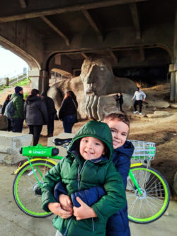 Taylor Kids with Seattle Troll LimeBikes bike sharing in Seattle waterfront 1