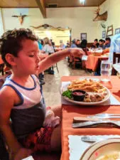 Taylor family dining at Hitching Post restaurant Casmalia Santa Maria Valley California 3