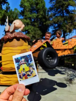 Taylor family on Kiddy ride at Camp Snoopy at Knotts Berry Farm Buena Park California 4