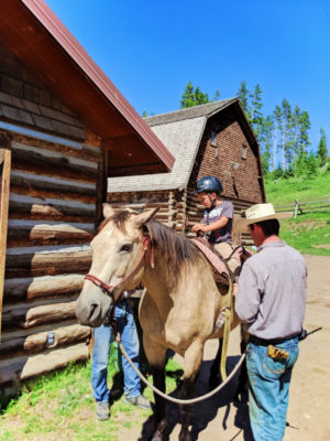 Taylor kids riding horses at 320 Guest Ranch Big Sky Montana 2