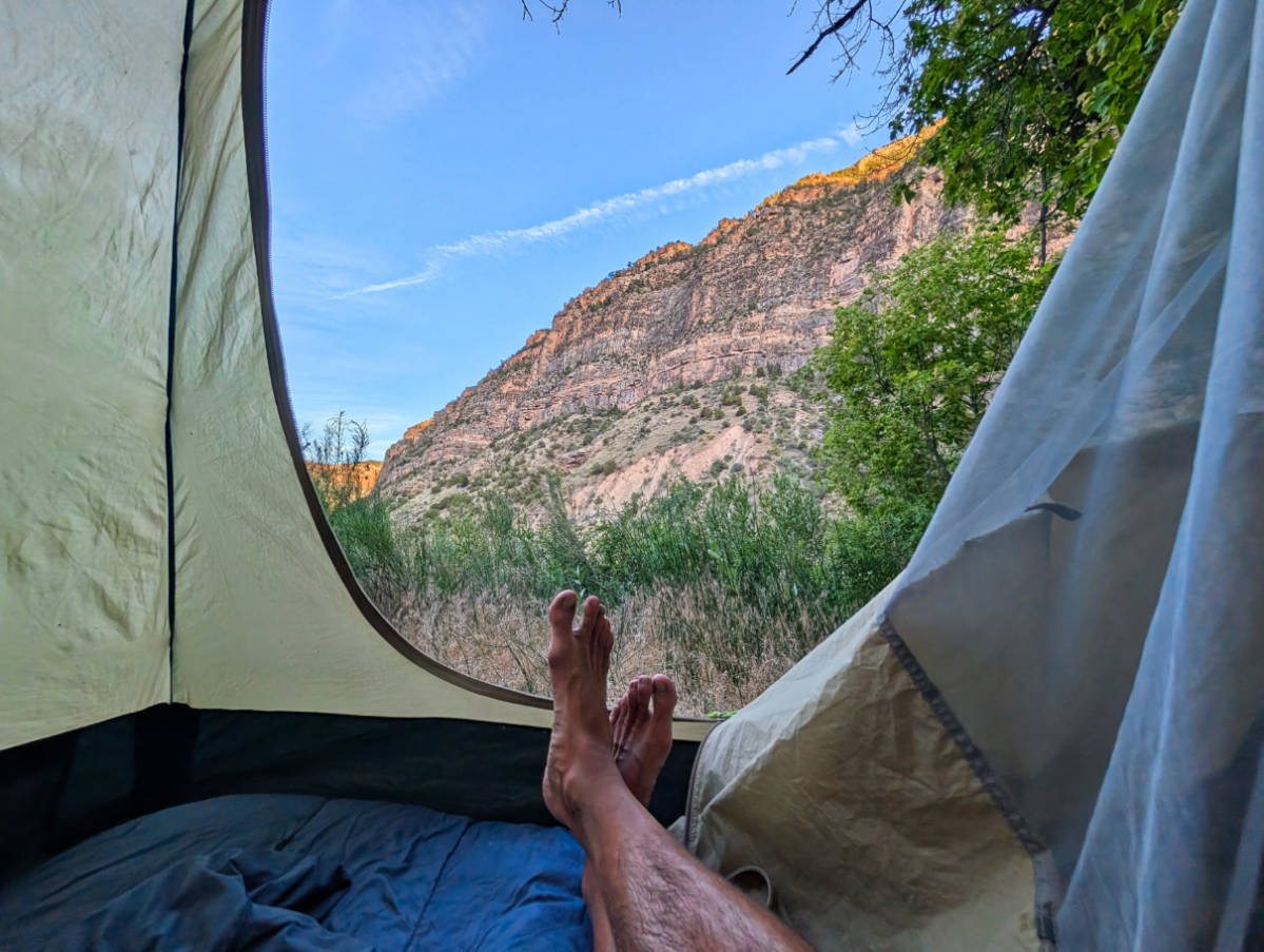 View from tent while camping on Green River rafting with OARS in Gates of Lodore Dinosaur National Monument Utah 1