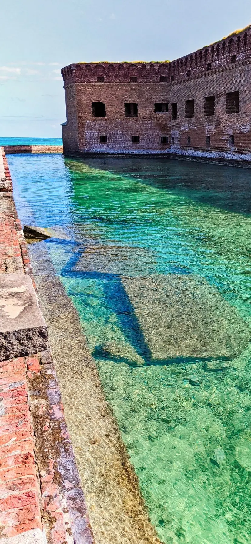 Turquoise water of moat around Fort Jefferson, Dry Tortugas National Park, Florida