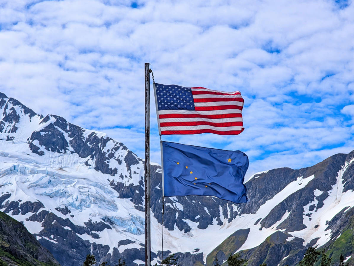 American Flag and Alaska Flag at Portage Valley Chugach National Forest Girdwood Alaska